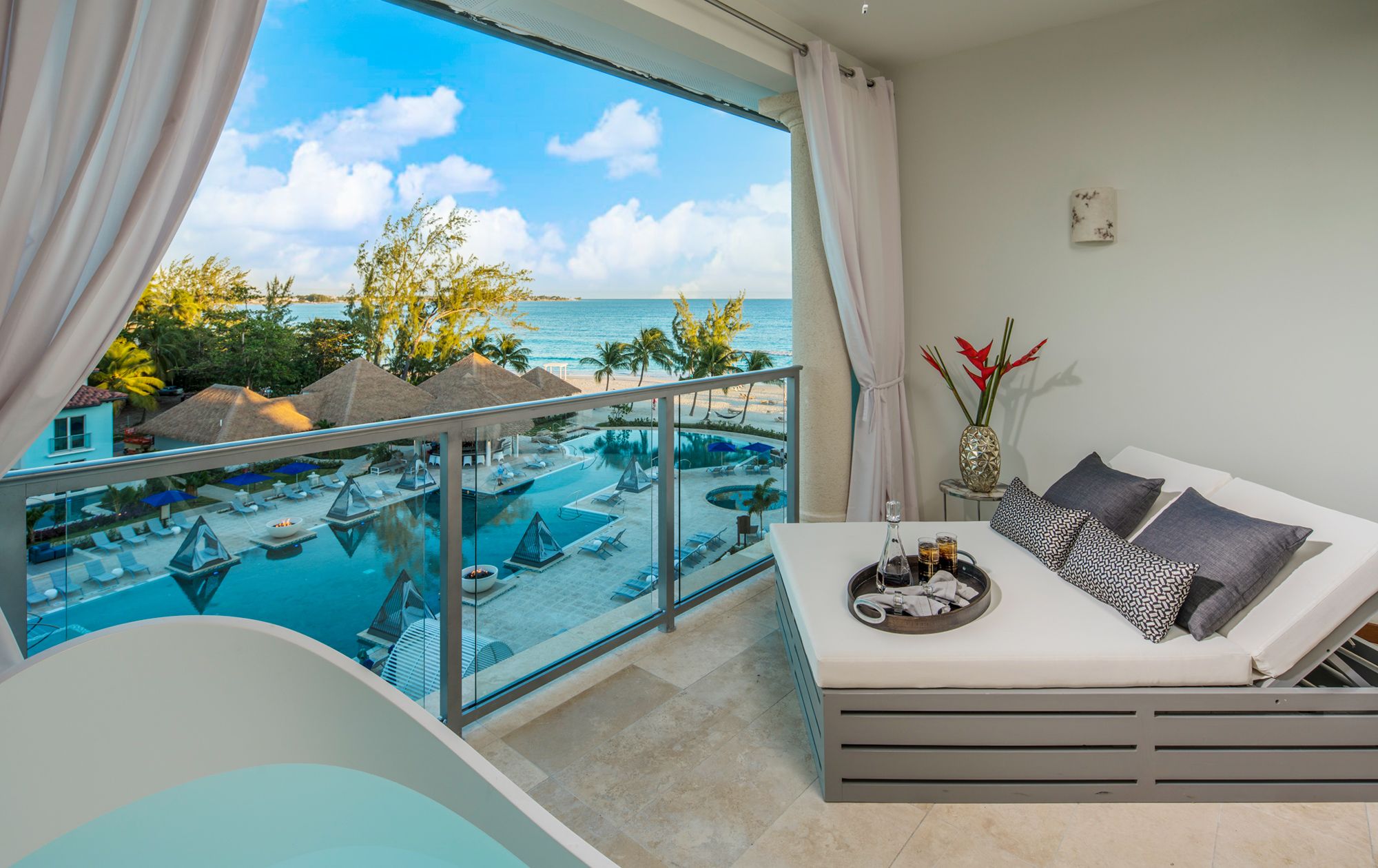 Ocean view hotel room example showing beach and water from the room